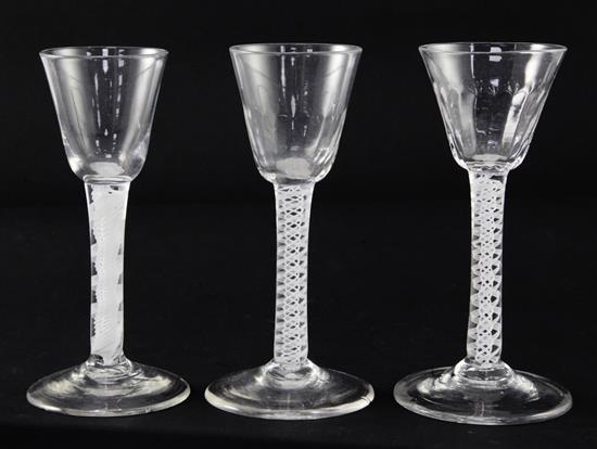 Three double series opaque twist stem wine glasses, c.1760-70, 14 - 14.5cm, two with chips